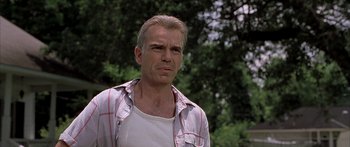 Movie still from “Monster's Ball” (2001), directed by Marc Forster – A person wearing a plaid shirt; Close Up shot, Low angle