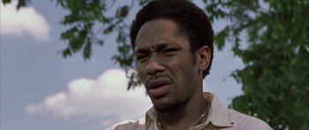 Movie still from “Monster's Ball” (2001), directed by Marc Forster – A person wearing a white shirt; Close Up shot, Low angle