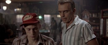 Movie still from “Monster's Ball” (2001), directed by Marc Forster – Two men standing next to each other in a room; Close Up shot, Over the shoulder angle