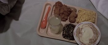 Movie still from “Monster's Ball” (2001), directed by Marc Forster – A tray of food and a glass of milk; Extreme Close Up shot, High angle