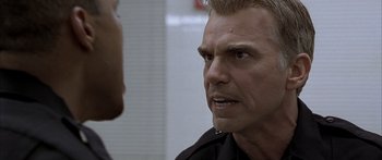 Movie still from “Monster's Ball” (2001), directed by Marc Forster – A person talking to another person; Close Up shot, Low angle