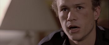 Movie still from “Monster's Ball” (2001), directed by Marc Forster – A person looking at the camera; Close Up shot, Low angle