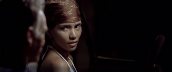 Movie still from “Monster's Ball” (2001), directed by Marc Forster – A woman wearing a head covering and looking at the camera; Close Up shot, High angle