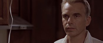 Movie still from “Monster's Ball” (2001), directed by Marc Forster – A person wearing a white shirt; Close Up shot, Low angle