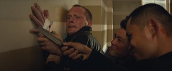 Movie still from “Mortdecai” (2015), directed by David Koepp – A man and a woman are combing their hair; Close Up shot, Over the shoulder angle