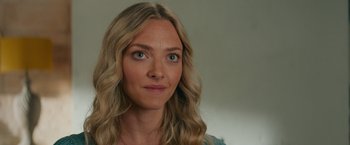 Movie still from “Mamma Mia! Here We Go Again” (2018), directed by Ol Parker – A person with long blonde hair; Close Up shot, Over the shoulder angle