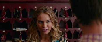 Movie still from “Mamma Mia! Here We Go Again” (2018), directed by Ol Parker – A person with long blonde hair; Close Up shot, Over the shoulder angle