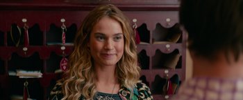Movie still from “Mamma Mia! Here We Go Again” (2018), directed by Ol Parker – A beautiful young woman with long blonde hair; Close Up shot, Over the shoulder angle