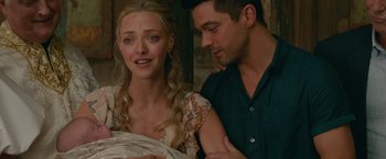 Movie still from “Mamma Mia! Here We Go Again” (2018), directed by Ol Parker – A man and a woman looking at each other; Close Up shot, Over the shoulder angle