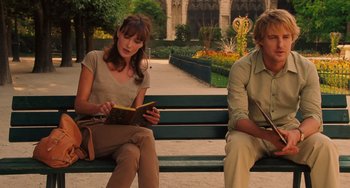 Movie still from “Midnight in Paris” (2011), directed by Woody Allen – A man and a woman sitting on a park bench; Medium shot, Over the shoulder angle