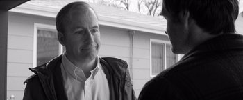 Movie still from “Nebraska” (2013), directed by Alexander Payne – A man and a woman talking outside of a house; Close Up shot, Over the shoulder angle