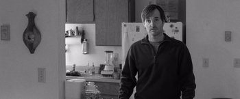 Movie still from “Nebraska” (2013), directed by Alexander Payne – A man standing in a kitchen next to a blender; Close Up shot, Over the shoulder angle