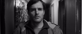 Movie still from “Nebraska” (2013), directed by Alexander Payne – Black and white photograph of a man in a hallway; Close Up shot, Low angle