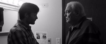 Movie still from “Nebraska” (2013), directed by Alexander Payne – A man and a woman talking to each other; Close Up shot, Over the shoulder angle