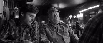 Movie still from “Nebraska” (2013), directed by Alexander Payne – Two men sitting next to each other in a room; Medium shot, Over the shoulder angle