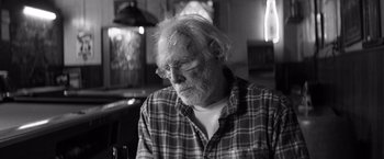 Movie still from “Nebraska” (2013), directed by Alexander Payne – An older man with a bandage on his head; Close Up shot, Low angle