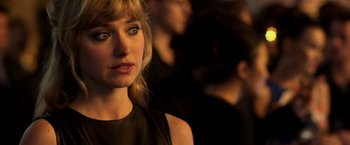 Movie still from “Need for Speed” (2014), directed by Scott Waugh – A person wearing a black dress; Close Up shot, Over the shoulder angle