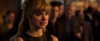 Movie still from “Need for Speed” (2014), directed by Scott Waugh – A person wearing a dress; Close Up shot, Over the shoulder angle