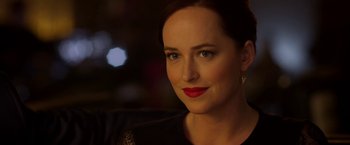 Movie still from “Need for Speed” (2014), directed by Scott Waugh – A person wearing a black shirt; Close Up shot, Over the shoulder angle