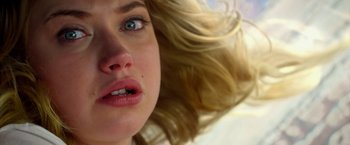 Movie still from “Need for Speed” (2014), directed by Scott Waugh – A woman's face with long blonde hair; Extreme Close Up shot, Low angle