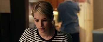 Movie still from “Nerve” (2016), directed by Henry Joost – A woman sitting in front of a computer screen; Close Up shot, Over the shoulder angle