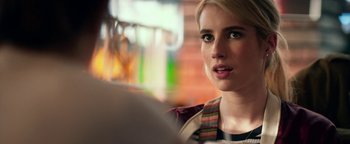 Movie still from “Nerve” (2016), directed by Henry Joost – A person sitting in front of a window; Close Up shot, Over the shoulder angle