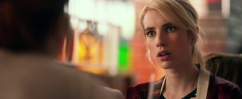 Movie still from “Nerve” (2016), directed by Henry Joost – A person sitting in a room; Close Up shot, Over the shoulder angle