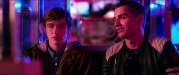 Movie still from “Nerve” (2016), directed by Henry Joost – Two young men sitting next to each other at a bar; Close Up shot, Over the shoulder angle