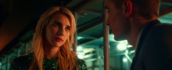 Movie still from “Nerve” (2016), directed by Henry Joost – A man and a woman standing next to each other; Close Up shot, Over the shoulder angle