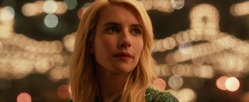 Movie still from “Nerve” (2016), directed by Henry Joost – A woman with blonde hair is looking at the camera; Close Up shot, Over the shoulder angle