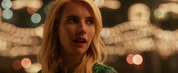 Movie still from “Nerve” (2016), directed by Henry Joost – A person with long blonde hair; Close Up shot, Over the shoulder angle