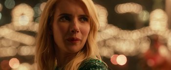 Movie still from “Nerve” (2016), directed by Henry Joost – A woman with blonde hair and a green dress; Close Up shot, Over the shoulder angle