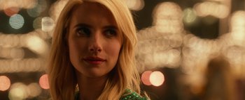 Movie still from “Nerve” (2016), directed by Henry Joost – A person with long blonde hair; Close Up shot, Over the shoulder angle