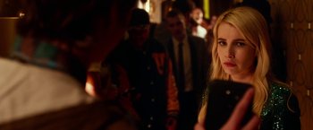 Movie still from “Nerve” (2016), directed by Henry Joost – A group of people standing in a room; Close Up shot, Over the shoulder angle