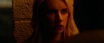 Movie still from “Nerve” (2016), directed by Henry Joost – A beautiful blonde haired woman with a red spot on her cheek; Close Up shot, Over the shoulder angle