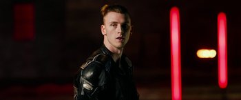 Movie still from “Nerve” (2016), directed by Henry Joost – A man in a leather jacket is looking at the camera; Close Up shot, Low angle