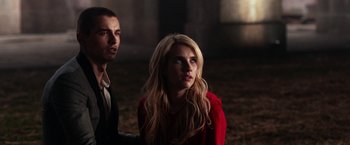 Movie still from “Nerve” (2016), directed by Henry Joost – A man and a woman standing next to each other; Close Up shot, Low angle