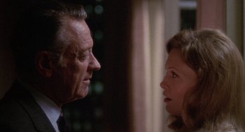 Movie still from “Network” (1976), directed by Sidney Lumet – An older man and a younger woman face to face; Close Up shot, Over the shoulder angle
