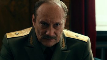 Movie still from “Never Look Away” (2018), directed by Florian Henckel von Donnersmarck – An older man wearing a military uniform; Close Up shot, Low angle