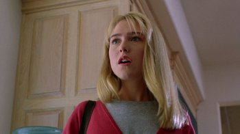 Movie still from “New Nightmare” (1994), directed by Wes Craven – A woman with blonde hair is looking up; Close Up shot, Low angle