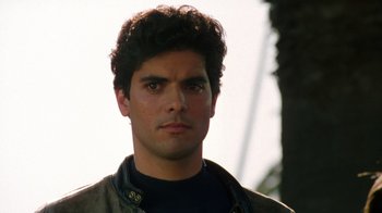 Movie still from “New Nightmare” (1994), directed by Wes Craven – A person wearing a jacket; Close Up shot, Low angle