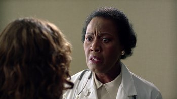 Movie still from “New Nightmare” (1994), directed by Wes Craven – An older black woman talking to a younger black woman; Close Up shot, Low angle