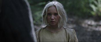 Movie still from “News of the World” (2020), directed by Paul Greengrass – A young woman with blonde hair and a tan shirt; Close Up shot, Over the shoulder angle