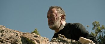 Movie still from “News of the World” (2020), directed by Paul Greengrass – An older man with a patch on his face; Close Up shot, Low angle