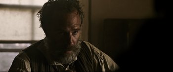 Movie still from “News of the World” (2020), directed by Paul Greengrass – An old man with a beard and a mustache; Close Up shot, Over the shoulder angle
