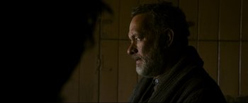 Movie still from “News of the World” (2020), directed by Paul Greengrass – A person wearing a sweater; Close Up shot, Low angle