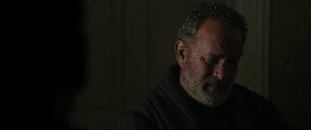 Movie still from “News of the World” (2020), directed by Paul Greengrass – An older man with grey hair is looking down at his face; Close Up shot, Over the shoulder angle
