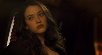 Movie still from “Nick and Norah's Infinite Playlist” (2008), directed by Peter Sollett – A beautiful young woman with long brown hair; Close Up shot, Low angle