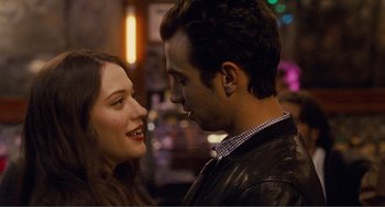 Movie still from “Nick and Norah's Infinite Playlist” (2008), directed by Peter Sollett – A man and a woman looking at one another; Close Up shot, Over the shoulder angle
