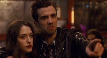 Movie still from “Nick and Norah's Infinite Playlist” (2008), directed by Peter Sollett – A man and a woman are standing next to each other; Close Up shot, Over the shoulder angle